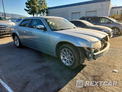 Czwarte zdjęcie samochodu z boku: 2005 CHRYSLER 300C VIN:2C3AA63H35H667495 - miniatura