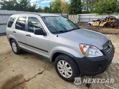 Czwarte zdjęcie samochodu z boku: 2006 HONDA CR-V LX VIN:JHLRD78536C028096 - miniatura