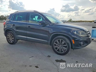Czwarte zdjęcie samochodu z boku: 2014 VOLKSWAGEN TIGUAN S VIN:WVGBV3AX3EW516439 - miniatura