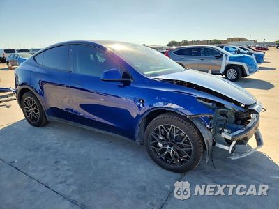 Czwarte zdjęcie samochodu z boku: 2023 TESLA MODEL Y VIN:7SAYGDEE2PA063963 - miniatura