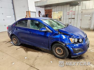 Czwarte zdjęcie samochodu z boku: 2014 CHEVROLET SONIC LS VIN:1G1JA5SHXE4114100 - miniatura