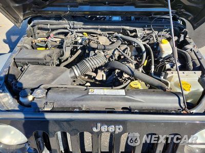 Zdjęcie 12 z 13 samochodu: 2011 JEEP WRANGLER UNLIMITED SPORT VIN:1J4HA3H16BL602332 - miniatura
