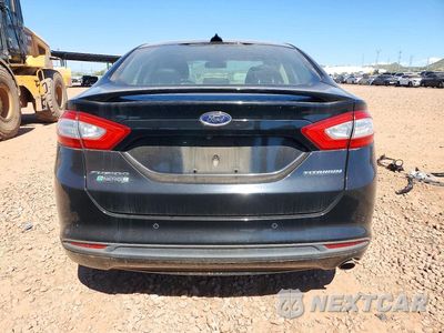 Zdjęcie 6 z 13 samochodu: 2016 FORD FUSION TITANIUM PHEV VIN:3FA6P0SU1GR141911 - miniatura