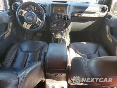 Zdjęcie 8 z 12 samochodu: 2014 JEEP WRANGLER UNLIMITED SAHARA VIN:1C4BJWEG8EL165430 - miniatura