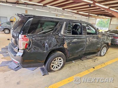 Trzecie zdjęcie samochodu z tyłu: 2021 CHEVROLET TAHOE C1500 LT VIN:1GNSCNKD3MR173419 - miniatura