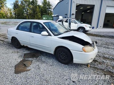Czwarte zdjęcie samochodu z boku: 2004 KIA SPECTRA BASE VIN:KNAFB121845312735 - miniatura