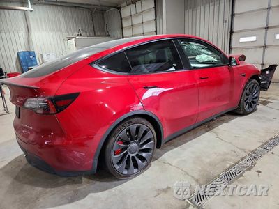Trzecie zdjęcie samochodu z tyłu: 2022 TESLA MODEL Y VIN:7SAYGDEF9NF540204 - miniatura