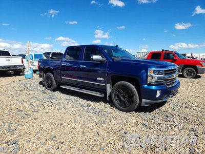 Czwarte zdjęcie samochodu z boku: 2017 CHEVROLET SILVERADO K1500 HIGH COUNTRY VIN:3GCUKTEC6HG443857 - miniatura