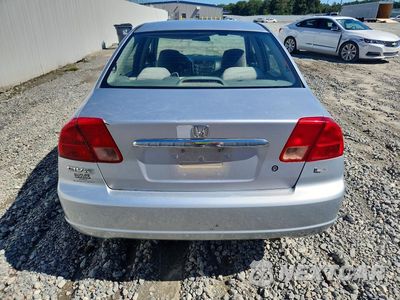 Zdjęcie 6 z 12 samochodu: 2002 HONDA CIVIC LX VIN:1HGES15582L000633 - miniatura