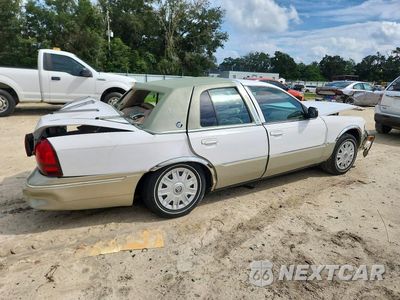 Trzecie zdjęcie samochodu z tyłu: 2004 MERCURY GRAND MARQUIS GS VIN:2MEFM74W14X692989 - miniatura