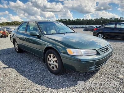 Czwarte zdjęcie samochodu z boku: 1999 TOYOTA CAMRY XLE V6 VIN:JT2BF28K4X0184984 - miniatura