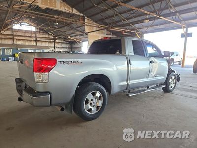 Trzecie zdjęcie samochodu z tyłu: 2011 TOYOTA TUNDRA DOUBLE CAB SR5 VIN:5TFRY5F15BX111716 - miniatura