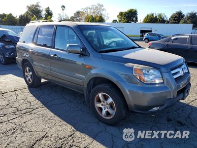 Czwarte zdjęcie samochodu z boku: 2007 HONDA PILOT EX-L VIN:2HKYF18577H511810 - miniatura