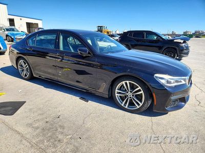 Czwarte zdjęcie samochodu z boku: 2019 BMW 750 I VIN:WBA7F0C54KGM24406 - miniatura