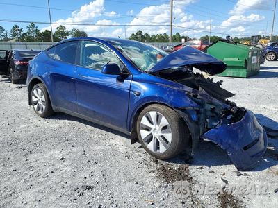 Czwarte zdjęcie samochodu z boku: 2024 TESLA MODEL Y VIN:7SAYGDEE3RA250700 - miniatura