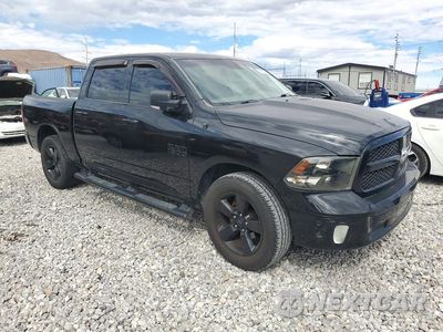 Czwarte zdjęcie samochodu z boku: 2018 RAM 1500 SLT VIN:1C6RR6LTXJS132878 - miniatura