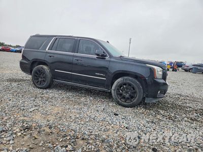 Czwarte zdjęcie samochodu z boku: 2015 GMC YUKON DENALI VIN:1GKS2CKJ1FR726565 - miniatura
