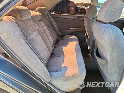 Zdjęcie 10 z 12 samochodu: 2004 TOYOTA CAMRY LE VIN:4T1BE32KX4U882962 - miniatura