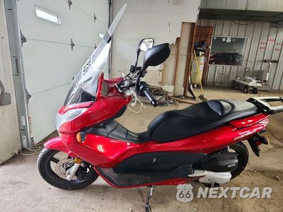 Trzecie zdjęcie samochodu z tyłu: 2013 HONDA PCX 150 VIN:MLHKF1217D5008024 - miniatura