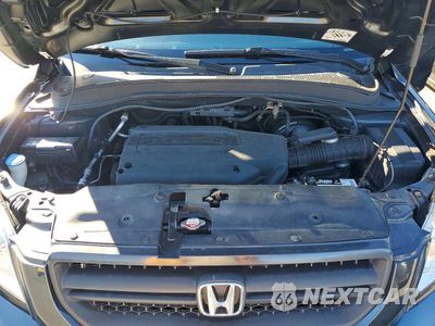 Zdjęcie 12 z 13 samochodu: 2004 HONDA PILOT EXL VIN:2HKYF18754H568858 - miniatura