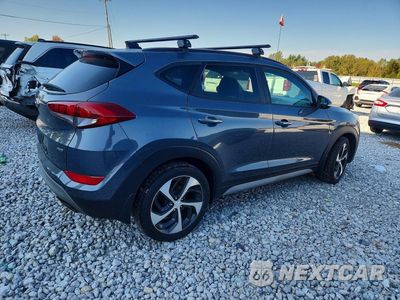 Trzecie zdjęcie samochodu z tyłu: 2018 HYUNDAI TUCSON VALUE VIN:KM8J3CA28JU752631 - miniatura