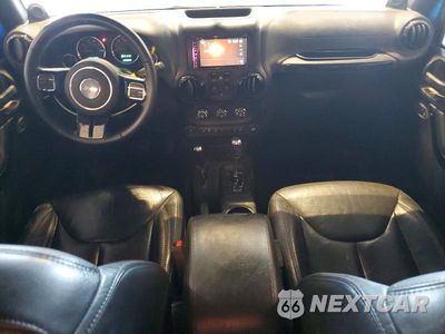 Zdjęcie 8 z 12 samochodu: 2014 JEEP WRANGLER UNLIMITED SAHARA VIN:1C4HJWEG9EL254093 - miniatura