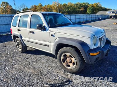 Czwarte zdjęcie samochodu z boku: 2004 JEEP LIBERTY SPORT VIN:1J4GL48KX4W109839 - miniatura