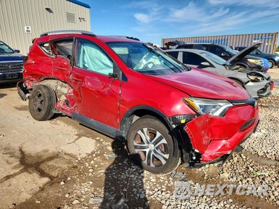 Czwarte zdjęcie samochodu z boku: 2016 TOYOTA RAV4 LE VIN:2T3BFREV0GW512539 - miniatura