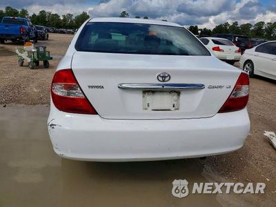 Zdjęcie 6 z 13 samochodu: 2004 TOYOTA CAMRY LE VIN:JTDBE32K540262774 - miniatura