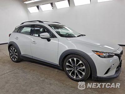 Czwarte zdjęcie samochodu z boku: 2019 MAZDA CX-3 TOURING VIN:JM1DKFC70K1401424 - miniatura