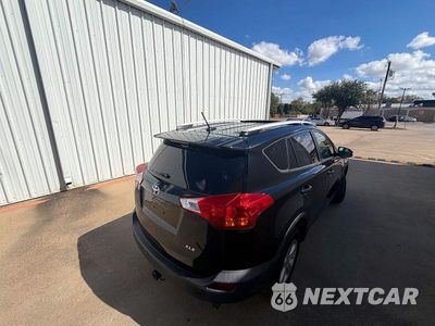 Czwarte zdjęcie samochodu z boku: 2014 TOYOTA RAV4 XLE VIN:2T3WFREV4EW117973 - miniatura