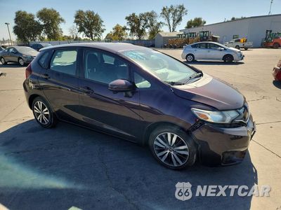 Czwarte zdjęcie samochodu z boku: 2015 HONDA FIT EX VIN:3HGGK5H82FM710217 - miniatura