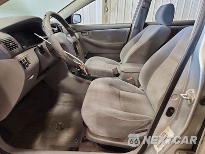Zdjęcie 7 z 12 samochodu: 2003 TOYOTA COROLLA CE VIN:JTDBR32EX32014618 - miniatura