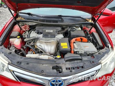 Zdjęcie 11 z 12 samochodu: 2014 TOYOTA CAMRY HYBRID XLE VIN:4T1BD1FKXEU135879 - miniatura