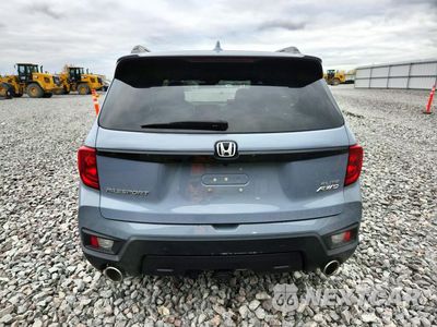 Zdjęcie 6 z 12 samochodu: 2022 HONDA PASSPORT ELITE VIN:5FNYF8H05NB001206 - miniatura