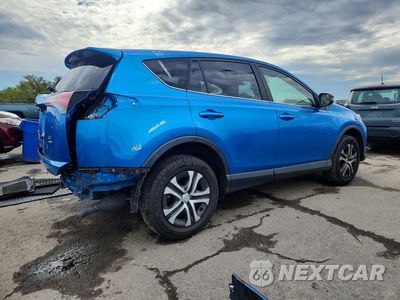 Trzecie zdjęcie samochodu z tyłu: 2018 TOYOTA RAV4 LE VIN:JTMBFREV2JJ183171 - miniatura