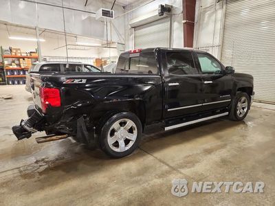Trzecie zdjęcie samochodu z tyłu: 2014 CHEVROLET SILVERADO K1500 LTZ VIN:3GCUKSEC7EG217011 - miniatura