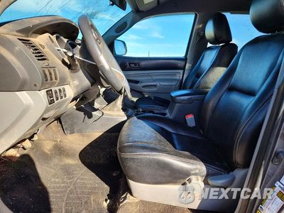 Zdjęcie 7 z 12 samochodu: 2014 TOYOTA TACOMA V6 VIN:5TFLU4EN2EX104856 - miniatura