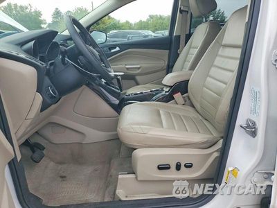 Zdjęcie 7 z 14 samochodu: 2016 FORD ESCAPE TITANIUM VIN:1FMCU9J96GUB03103 - miniatura