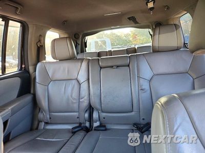 Zdjęcie 10 z 13 samochodu: 2014 HONDA PILOT TOURING VIN:5FNYF4H91EB036008 - miniatura