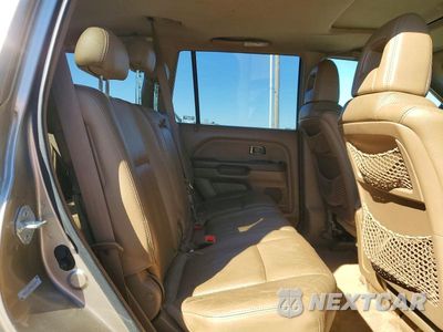 Zdjęcie 11 z 14 samochodu: 2005 HONDA PILOT EXL VIN:2HKYF18785H570539 - miniatura