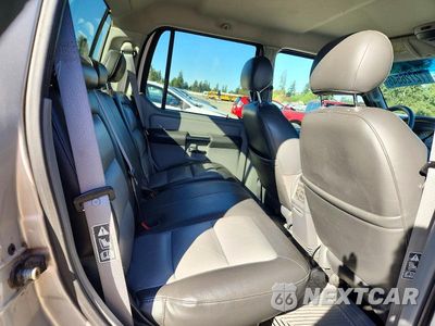 Zdjęcie 10 z 12 samochodu: 2003 FORD EXPLORER SPORT TRAC VIN:1FMZU77E33UC31635 - miniatura