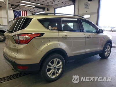 Trzecie zdjęcie samochodu z tyłu: 2018 FORD ESCAPE SEL VIN:1FMCU9HDXJUB15076 - miniatura