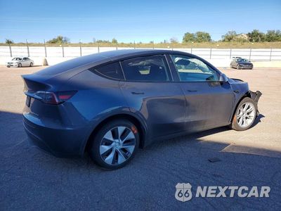 Trzecie zdjęcie samochodu z tyłu: 2023 TESLA MODEL Y VIN:7SAYGDEE7PF839765 - miniatura