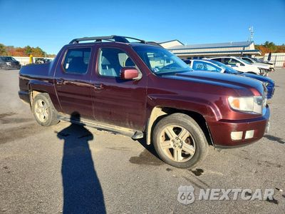 Czwarte zdjęcie samochodu z boku: 2010 HONDA RIDGELINE RTL VIN:5FPYK1F53AB005838 - miniatura