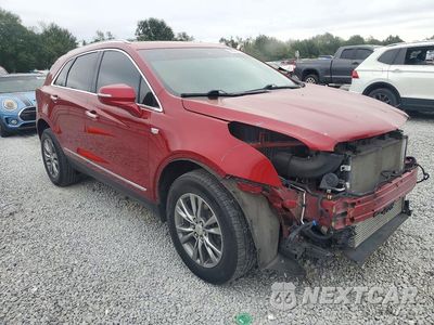 Czwarte zdjęcie samochodu z boku: 2023 CADILLAC XT5 PREMIUM LUXURY VIN:1GYKNCR49PZ112555 - miniatura