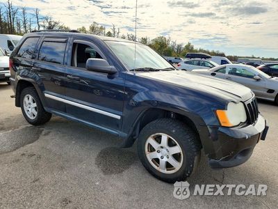 Czwarte zdjęcie samochodu z boku: 2010 JEEP GRAND CHEROKEE LAREDO VIN:1J4PR4GK1AC147294 - miniatura