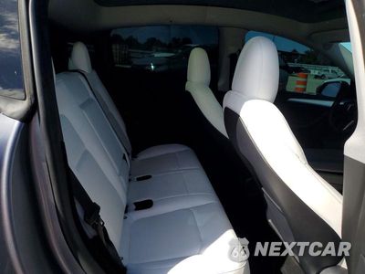 Zdjęcie 10 z 12 samochodu: 2024 TESLA MODEL Y VIN:7SAYGDEF3RA299064 - miniatura