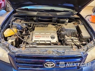 Zdjęcie 12 z 13 samochodu: 2004 TOYOTA HIGHLANDER BASE VIN:JTEEP21A940062325 - miniatura