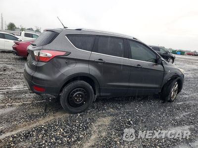 Trzecie zdjęcie samochodu z tyłu: 2017 FORD ESCAPE TITANIUM VIN:1FMCU0J97HUB36575 - miniatura